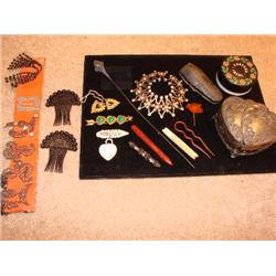 Ladies items, hat pin, hair pins, buckles, clips.