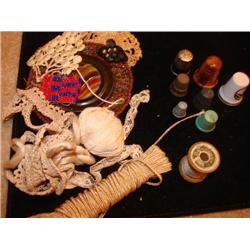 7 thimbles with old lace