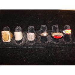 6 rings, some are sterling, one is beaded