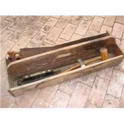 Old wood tool box with old tools, saws,hammers.