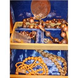 Old jewelry box filled with 4 necklaces
