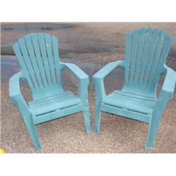 2 green plastic Adirondack chairs