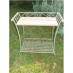 Metal table with natural wicker top