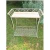 Image 1 : Metal table with natural wicker top