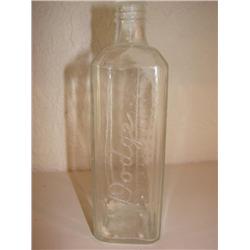 8" glass bottle marked "Dodge" w/measure marks