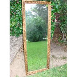 Ornate wood frame gold mirror