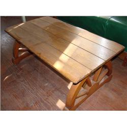 Ranch style coffee table, wagon wheel design on sides