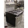Image 2 : GARLAND FOUR BURNER GAS RANGE W/ OVEN