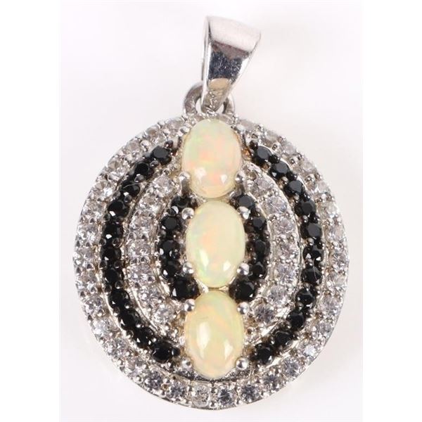 OVAL ETHIOPIAN OPAL, BLACK SPINEL & TOPAZ PENDANT