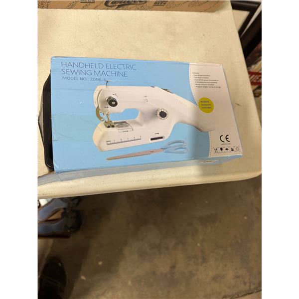 Handheld electric sewing machine