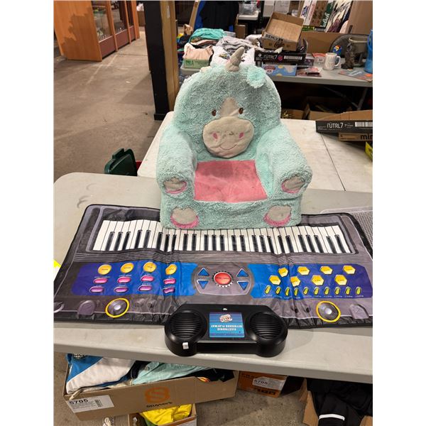Children's seat and electronic keyboard play mat