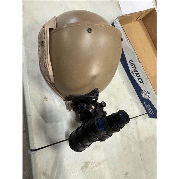 Helmet with binoculars
