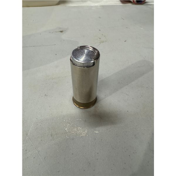 Bullet coin holder