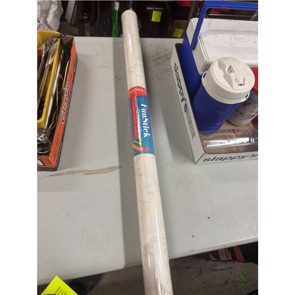 Self adhesive item