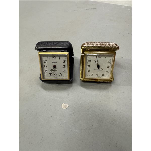 Travel alarm clocks