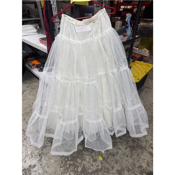 Floor length crinaline expandable waist to 26 inches