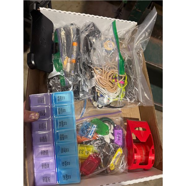 Keychains, tape dispenser, pill container, and other items