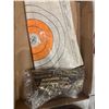 Image 1 : Empty shell, casings, and target