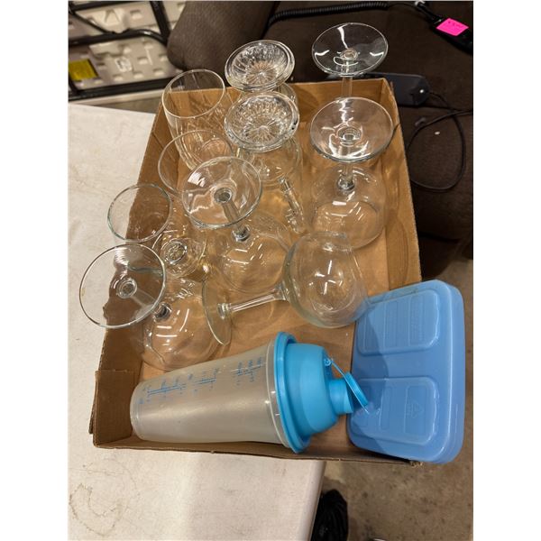 Assorted glasses, tupperware shaker, and ice pack
