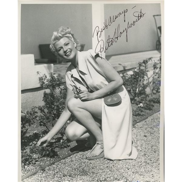 Rita Hayworth signed photo. GFA Authenticated