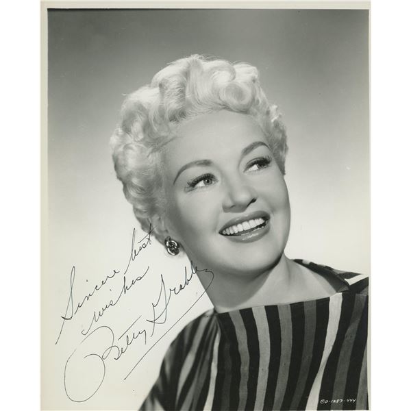 Betty Grable signed photo. GFA Authenticated