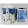 Image 1 : WATERPIK WITH EXTRA PIKS - NEW (NO BOX)