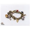 Image 1 : CHARM BRACELET WITH ASSORTMENT OF CHARMS