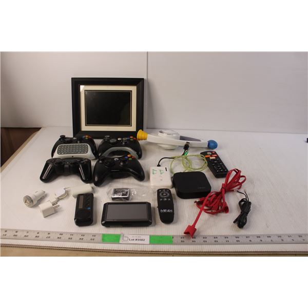 (4) Game Controllers, Digital Photo Frame 10.75" x 9" (No Cord), Bop It Game, Garmin Nuvi GPS (No Co