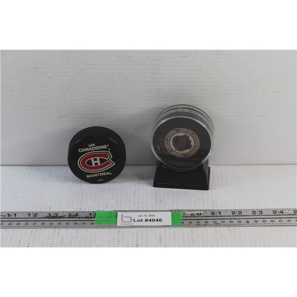 Phoenix Coyotes and Montreal Canadiens Hockey Pucks