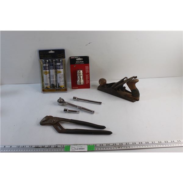 Multi Purpose Lithium Grease, Battery Brush, Pipe Wrench, Wood Plane and Wrench