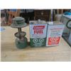 Image 1 : two camping fuel cans and a lantern