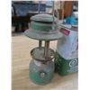 Image 5 : two camping fuel cans and a lantern
