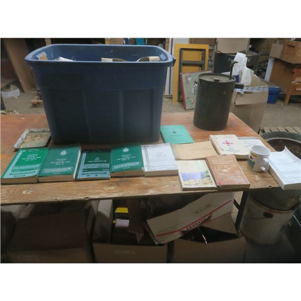 weapon manuals and mugs and army message books