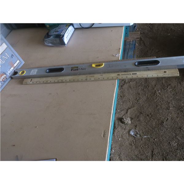 two meter sticks and level