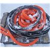 Image 2 : orange tubing, barb wire bundle and a bundle of wire