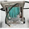 Image 2 : garden hose reel cart with garden hose and nozzle