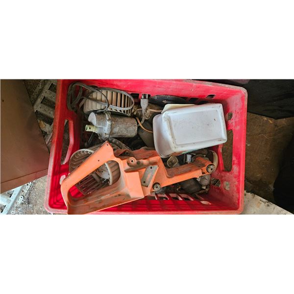 milk crate of assorted parts