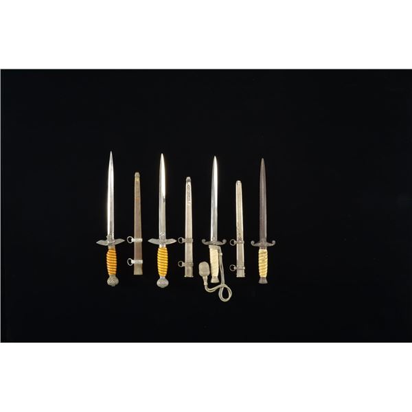 4 WWII GERMAN DAGGERS.