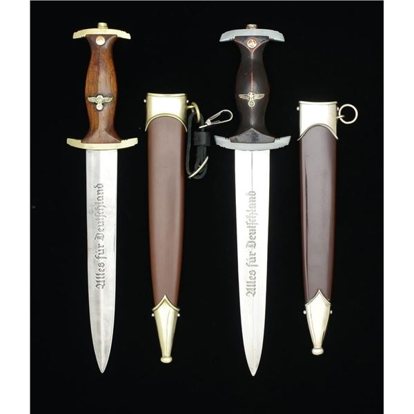 2 WWII STYLE GERMAN SA DAGGERS.