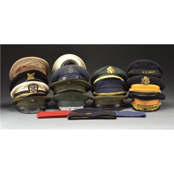 LARGE LOT OF MILITARY HATS MOSTLY OF THE WWII ERA.