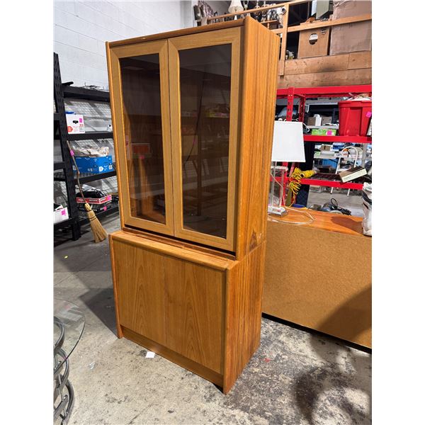Teak cabinet measures 33 1/2" x 18" x 71 1/2" tall piece