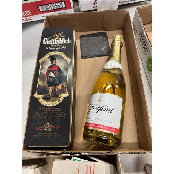 Sparkling alcohol free drink and scotch, whiskey tin