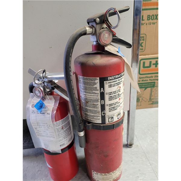 Two Fire Extinguishers Fully Charged but Not Recently Certified