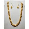 Image 1 : 11) STRAND OF GOLDEN YELLOW 17" PEARLS AND