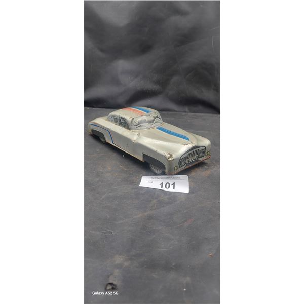 Vintage Pressed steel friction power toy car 9" long'