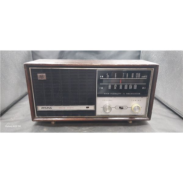 Vintage rising AM/FM transistor radio model FM-210 Tested