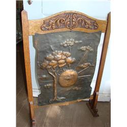 Carved wood fireplace screen w/copper insert