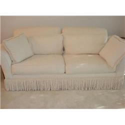 Overstuffed chenille sofa w/pillows, fringe base