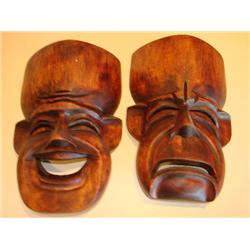 2 wooden African tribal masks