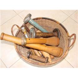 Basket filled with old wooden spools